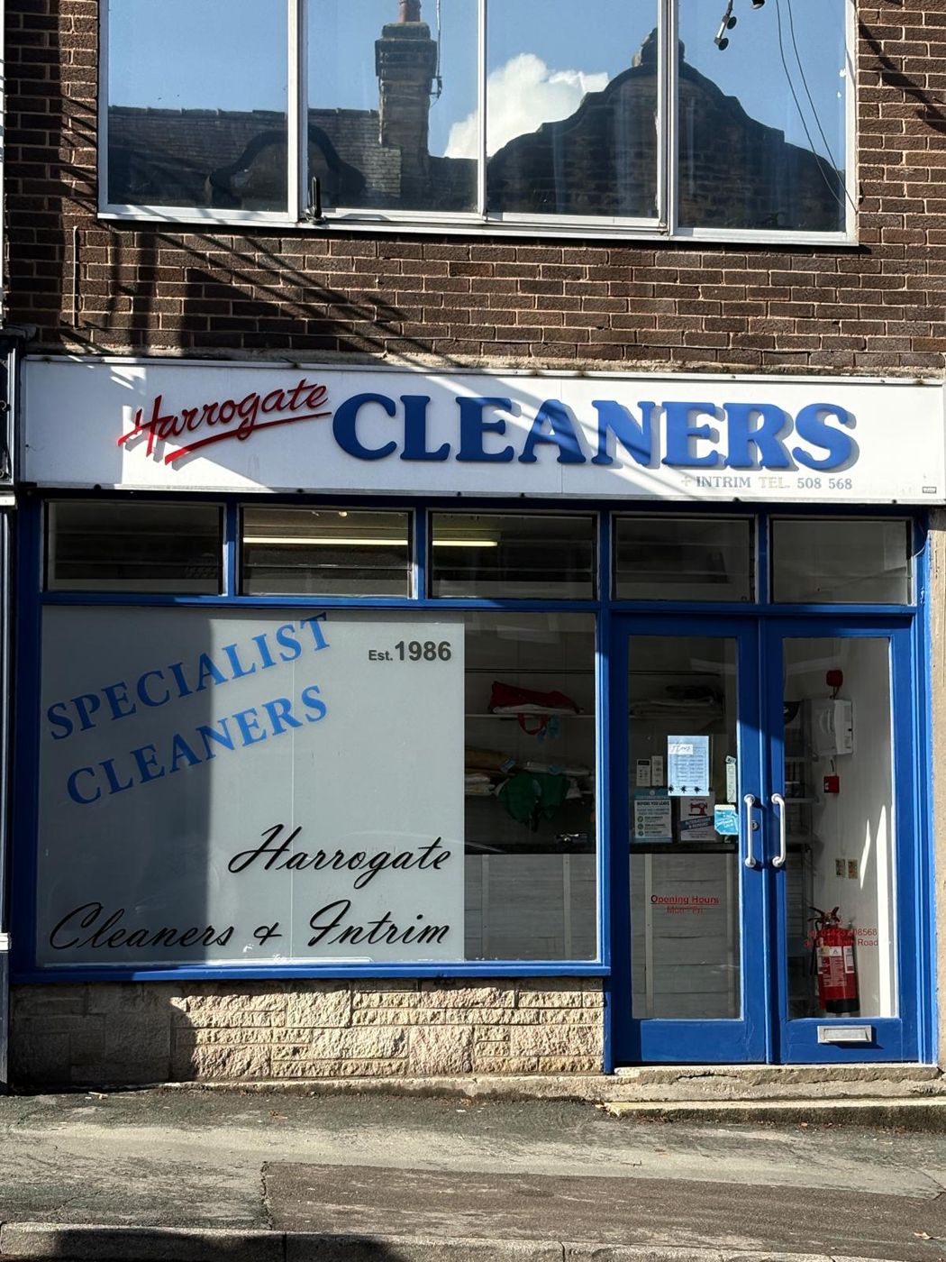 Harrogate Cleaners on Cold Bath Road, with the Est. 1986 window sign